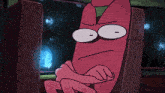 a cartoon character is sitting in a chair with a pattern that says ' o ' on it