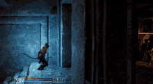 a video game screen shows a man holding a stick