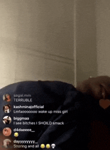 a man is laying down with a bunch of people behind him and one of them says terrible
