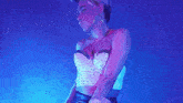 a woman in a white top is surrounded by a target