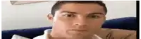 a close up of a man 's face sitting on a couch .