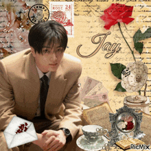 a man in a suit sits in front of an envelope that says jay
