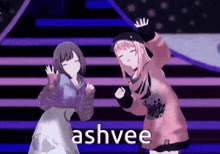 two anime girls are dancing on a stage with the word ashvee written on the bottom .