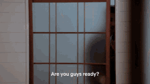 a sliding glass door with the words " are you guys ready " below it