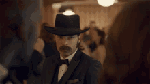 removes hat at party bring wynonna home doc holliday john henry holliday formal
