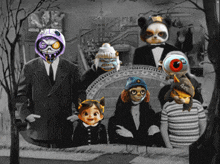 a black and white photo of a family with masks on including one that says 420
