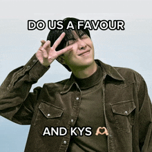 a man giving a peace sign with the words do us a favour and kys above him