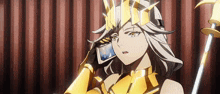 a girl in a crown is talking on a cell phone .