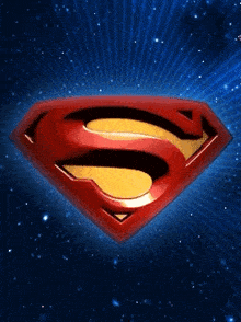 a red and yellow superman logo against a blue sky