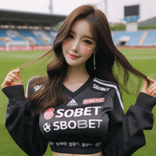 a woman wearing a shirt that says sobet sbobet