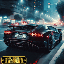 a black lamborghini sports car is parked on the side of the road