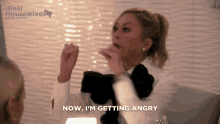 a woman says " now i 'm getting angry " in a real housewives advertisement