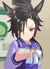 a black haired anime character is holding a cell phone in her hand