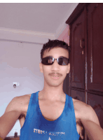 a man wearing sunglasses and a blue tank top that says 2thot2 adjust on it