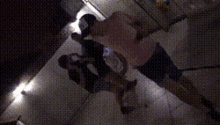 a blurry picture of a person standing in a room