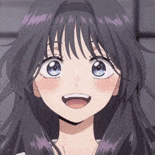 a close up of a girl 's face with her mouth open