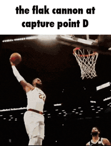 a basketball player is jumping in the air to catch a basketball .