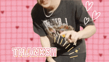 a man wearing a black shirt that says thunder 1