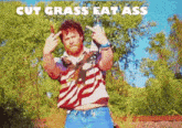 a man wearing an american flag shirt is giving the middle finger