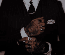 Black Suit Mafia GIF - Black Suit Mafia Tattoo GIFs