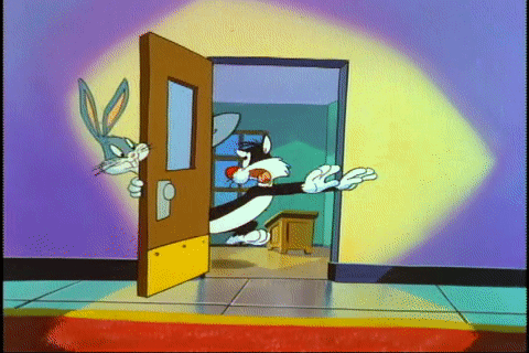 Tweety hitting Sylvester with a shovel, causing him to break into pieces