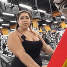 a woman in a gym with a sign that says free