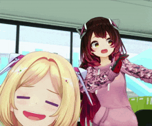 a girl in a pink sweater is standing next to another girl in a pink sweater