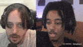 a man wearing headphones next to another man