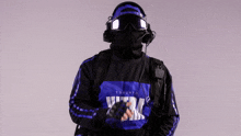 a man wearing a toronto sweatshirt and headphones