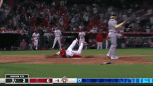a baseball game between the a's and the angels is in progress