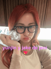 yunjin y jake de jeni is written on a picture of a girl