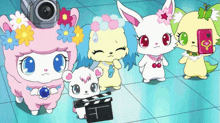 a group of cartoon characters are standing around a clapper board and a camera