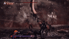 a video game character is fighting a demon with a sword in a dark cave .