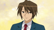 a man in a suit and tie is smiling