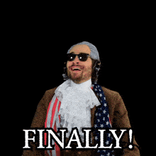 a man in a patriotic costume has his arms in the air and the word finally is behind him