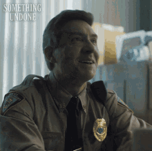 Laughing Officer Miles GIF - Laughing Officer Miles Something Undone GIFs