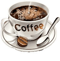 a cup of coffee on a saucer with a spoon and a coffee bean