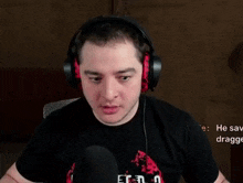 a man wearing headphones is making a surprised face .