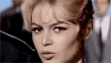 Brigitte Bardot Wink GIF - Brigitte Bardot Wink Pout GIFs