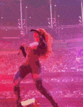 a woman in a galaxy costume is holding a microphone