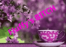 a cup of tea with a bird sitting on a branch in the background .