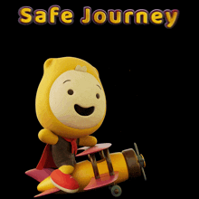 a yellow teddy bear is sitting on a yellow airplane with the words safe journey above him