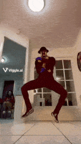 a man in a clown costume is jumping in the air in a room .