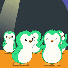 a group of green and white penguins stand together