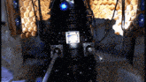 a robot with a blue light coming out of its head