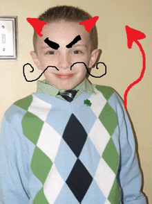 a boy with a devil face drawn on his forehead