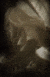 a painting of a man with a beard holding a sword in his hand .