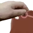 a close up of a person 's hand touching another person 's arm .