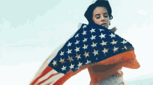 Hmmm GIF - Lana Del Ray American Flag Independence Day GIFs