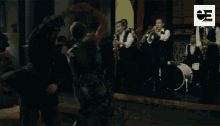 a blurred image of a band with the letters ea on the bottom right